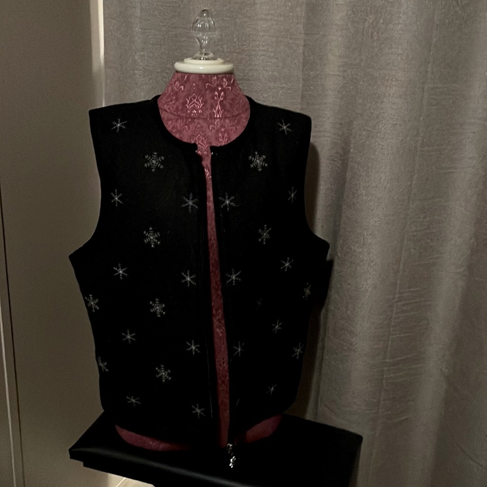 Dark gray Talbots vest with soft, red lining, size L.